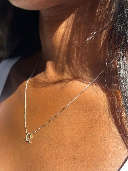 Hanging initial charm necklace with diamonds