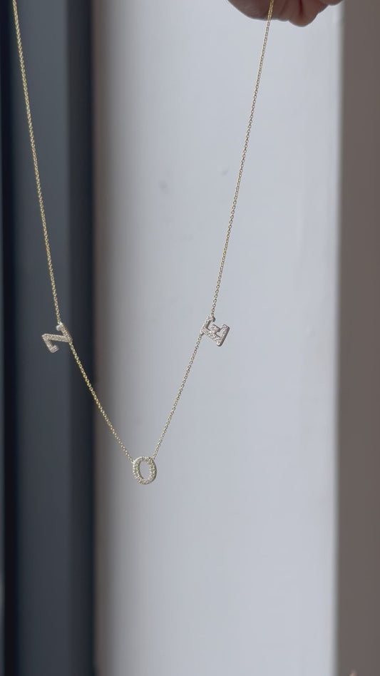 Hanging Initial name necklace with diamonds in 14kt yellow gold (18” chain)